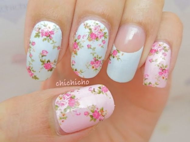 unhas decoradas com flores no fundo branco e rosa